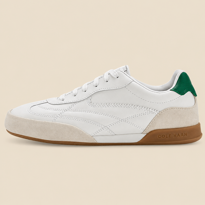 Cole Haan GrandPro Turf 2.0 white leather sneaker with green heel tab, side view