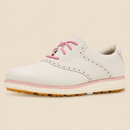 Cole Haan OriginalGrand Saddle Golf — side view on cream background