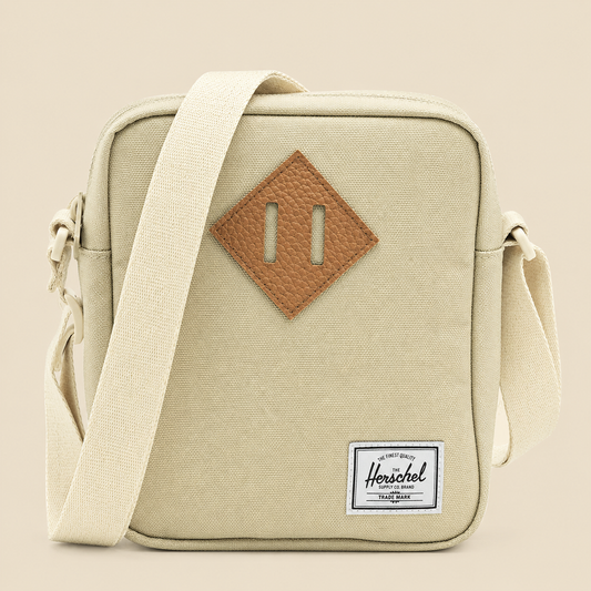 Herschel Heritage Crossbody — front view on cream background