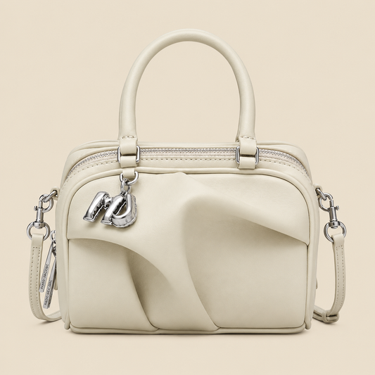 Marc Jacobs The Micro Wave — front view on cream background